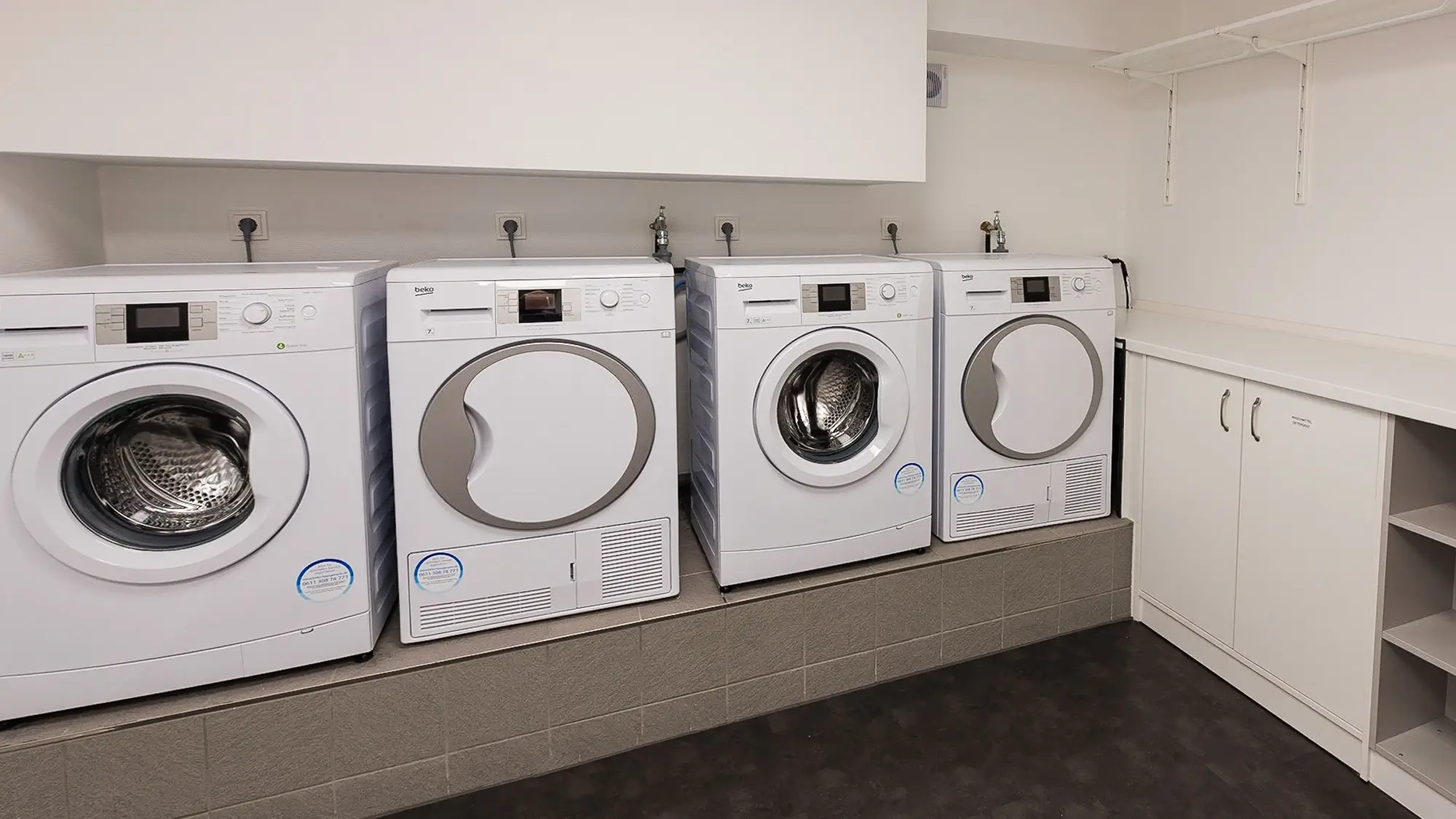 Washing machines and dryers in the laundry room